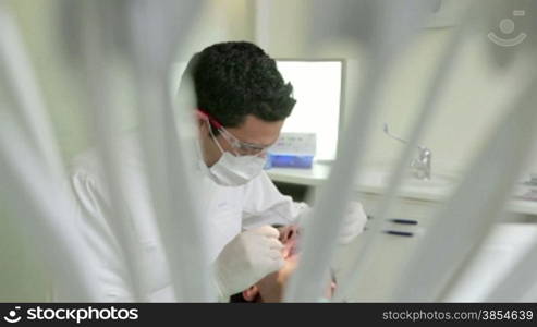 Doctor at work as dentist, visiting patient in dental studio, people and oral hygiene, medicine and staff in hospital. 16of19