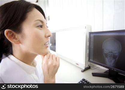 Doctor checking a scan
