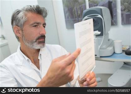 doctor checking medical tests results