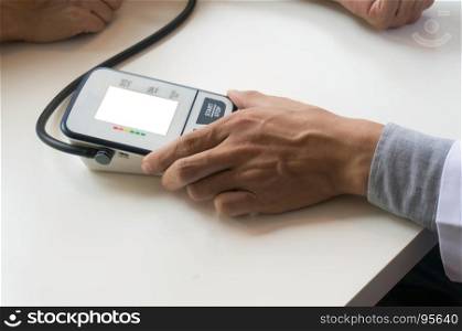 Doctor checking old woman patient arterial blood pressure. Health care