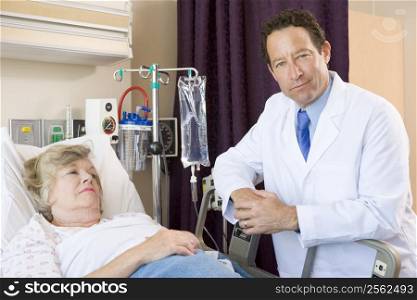 Doctor Checking Up On Patient In Hospital