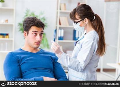 Doctor checking up patient in first aid concept