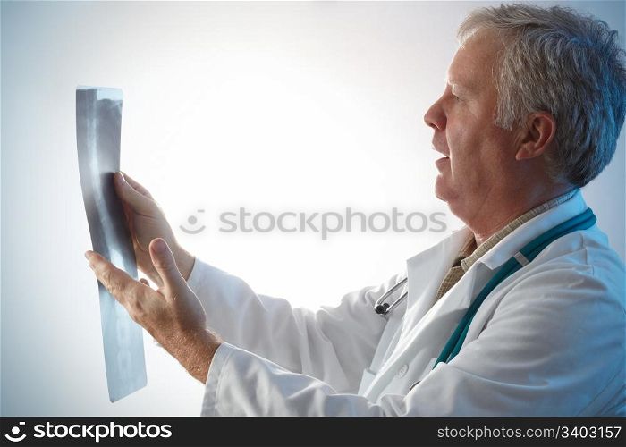 Doctor checking with surprise x-ray of a patient