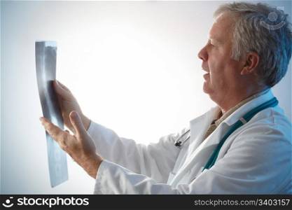 Doctor checking with surprise x-ray of a patient