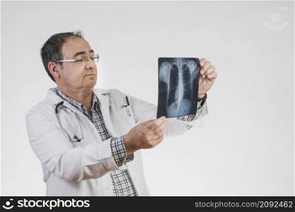 doctor checking x ray scan