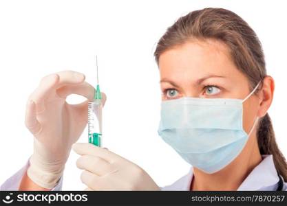 doctor concentrated in sterile clothing with syringe isolated