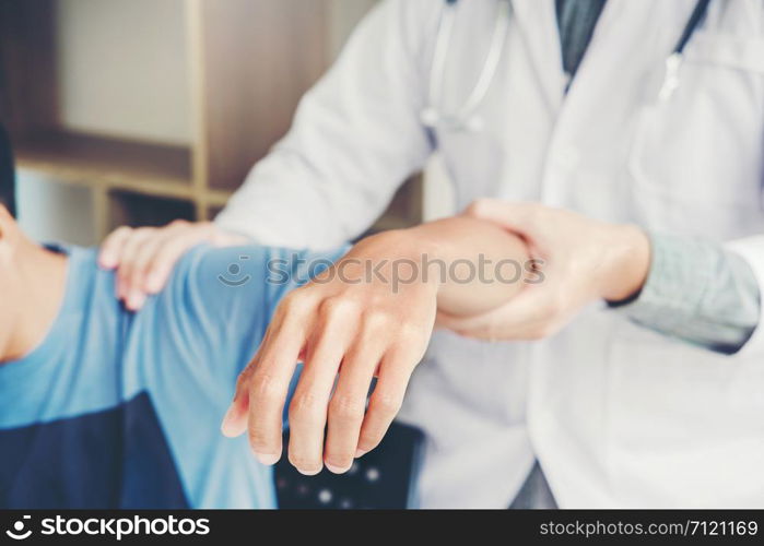 Doctor consulting with patient Shoulder problems Physical therapy diagnosing concept