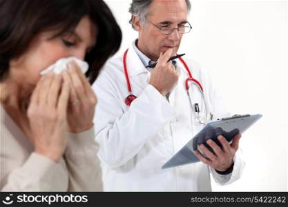 doctor examining a patient
