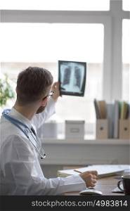 Doctor examining an lungs x-ray. Medicine and healthcare