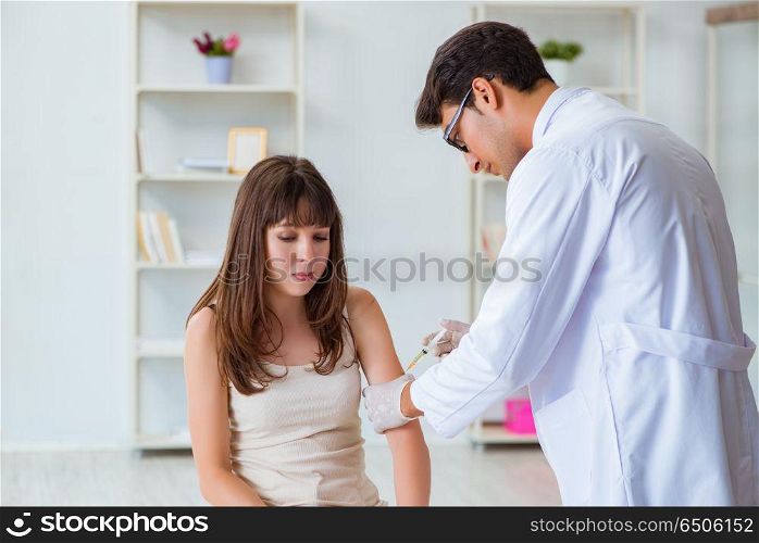 Doctor examining the skin of female patient