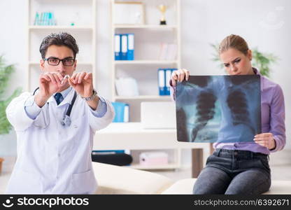 Doctor examining x-ray images of patient