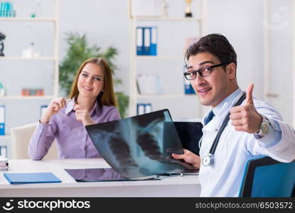 Doctor examining x-ray images of patient