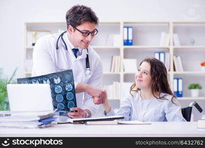 Doctor explaining to patient results of x-ray imaging