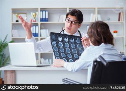 Doctor explaining to patient results of x-ray imaging