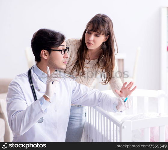 Doctor explaining to young mother. The doctor explaining to young mother
