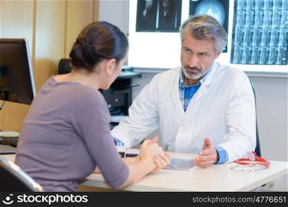 Doctor giving bad news to patient