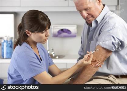 Doctor Giving Male Patient Injection