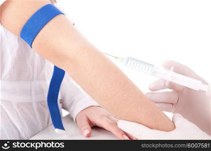 Doctor giving vaccine to a young woman