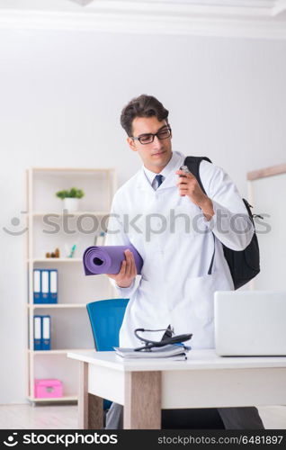 Doctor going to gym during lunch break