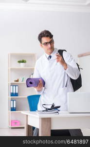 Doctor going to gym during lunch break