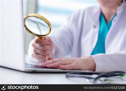 Doctor hand with magnifying glass