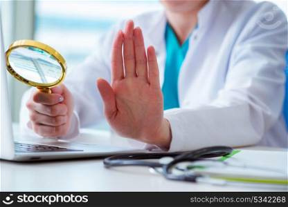 Doctor hand with magnifying glass