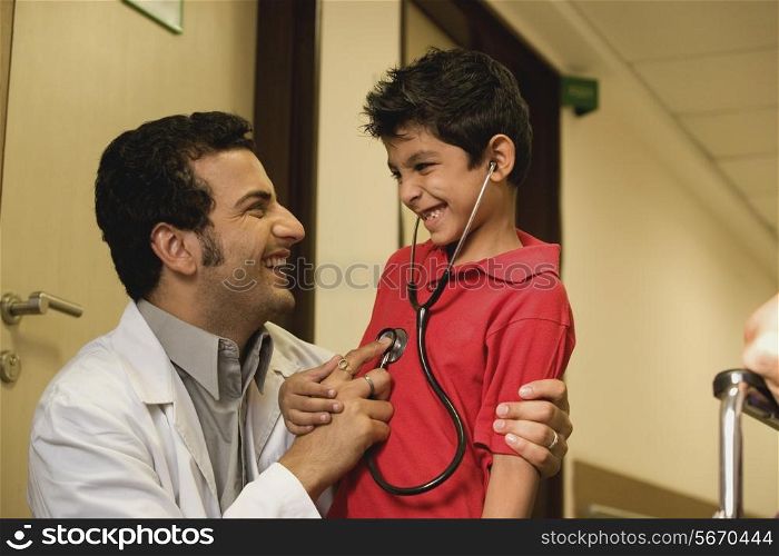 Doctor having fun with his patient
