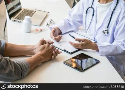 Doctor healthcare. Professional medical doctor in white uniform gown coat interview consulting patient reassuring his male patient helping 