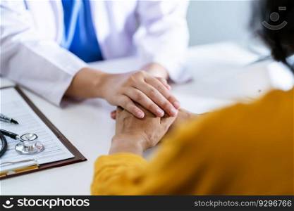 Doctor healthcare. Professional medical doctor in white uniform gown coat interview consulting patient reassuring his male patient helping hand