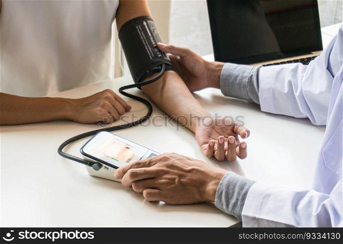 Doctor healthcare. Professional medical doctor in white uniform gown coat interview consulting patient reassuring his male patient helping 