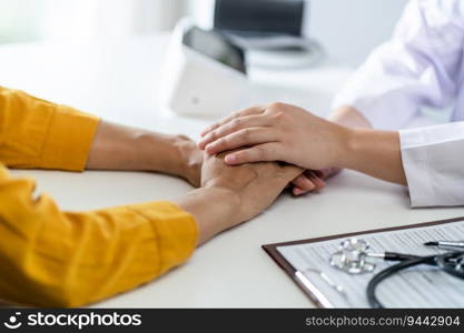 Doctor healthcare. Professional medical doctor in white uniform gown coat interview consulting patient reassuring his male patient helping hand