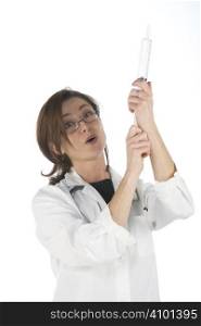 doctor holding a big syringe and getting ready for injection