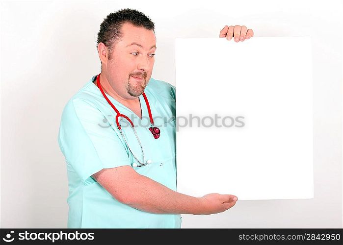 Doctor holding a blank sign