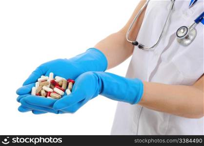 doctor holding a pills. Isolated on white background