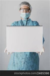 doctor holding blank card