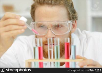 doctor holding blood sample tube