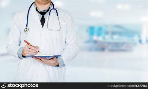 Doctor holding clipboard and stethoscope on background of Hospital ward