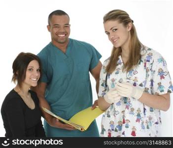 Doctor holding file, nurse holding syringe and patient all smiling at camera. Shot in studio over white.