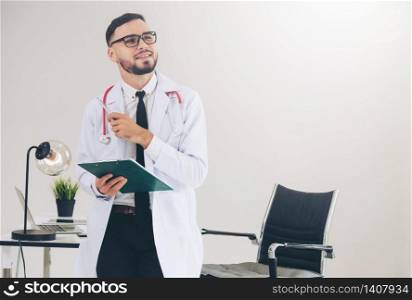 Doctor holding patients health file at office table in the hospital. Medical and healthcare concept.. Doctor holding patients health file in hospital.
