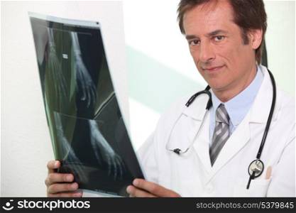 doctor holding radiography