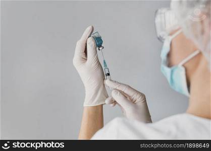 doctor holding syringe vaccine. Resolution and high quality beautiful photo. doctor holding syringe vaccine. High quality beautiful photo concept