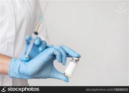 doctor holding syringe with vaccine. Resolution and high quality beautiful photo. doctor holding syringe with vaccine. High quality beautiful photo concept