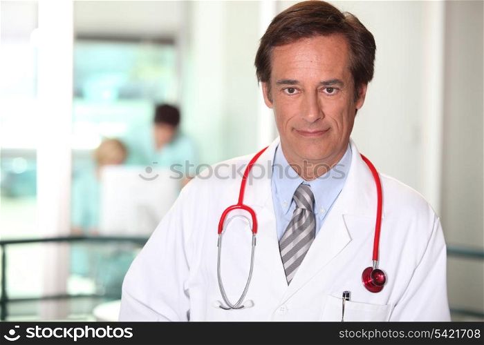 Doctor in a white coat and stethoscope