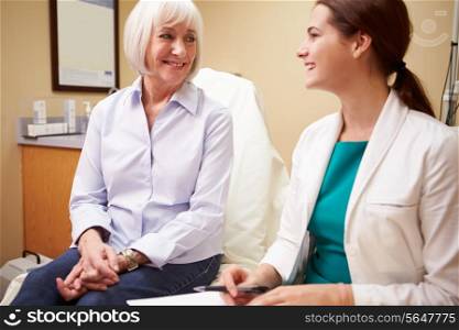 Doctor In Consultation With Senior Female Patient