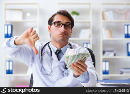 Doctor in corruption concept with being offered bribe