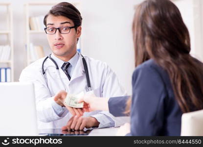 Doctor in corruption concept with being offered bribe