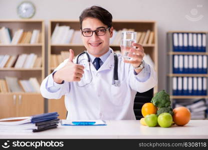 Doctor in dieting concept with fruits and vegetables