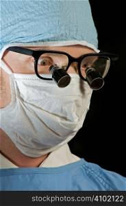 doctor in mask and glasses ready for surgery