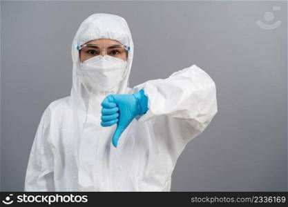 doctor in protective PPE suit doing thump down hand sign