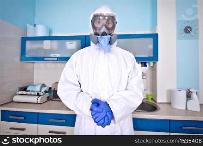 Doctor in protective suit uniform and mask. Coronavirus outbreak. Covid-19 concept.